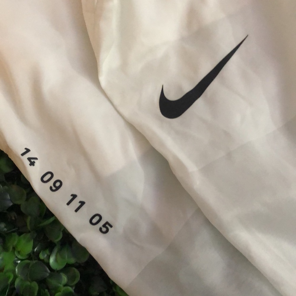 Nike women’s small track pant with pockets semi sheer